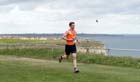 Dan Jenkin (Durham City) leads the Pier to Pier Race, South Shields to Roker, Sunderland.